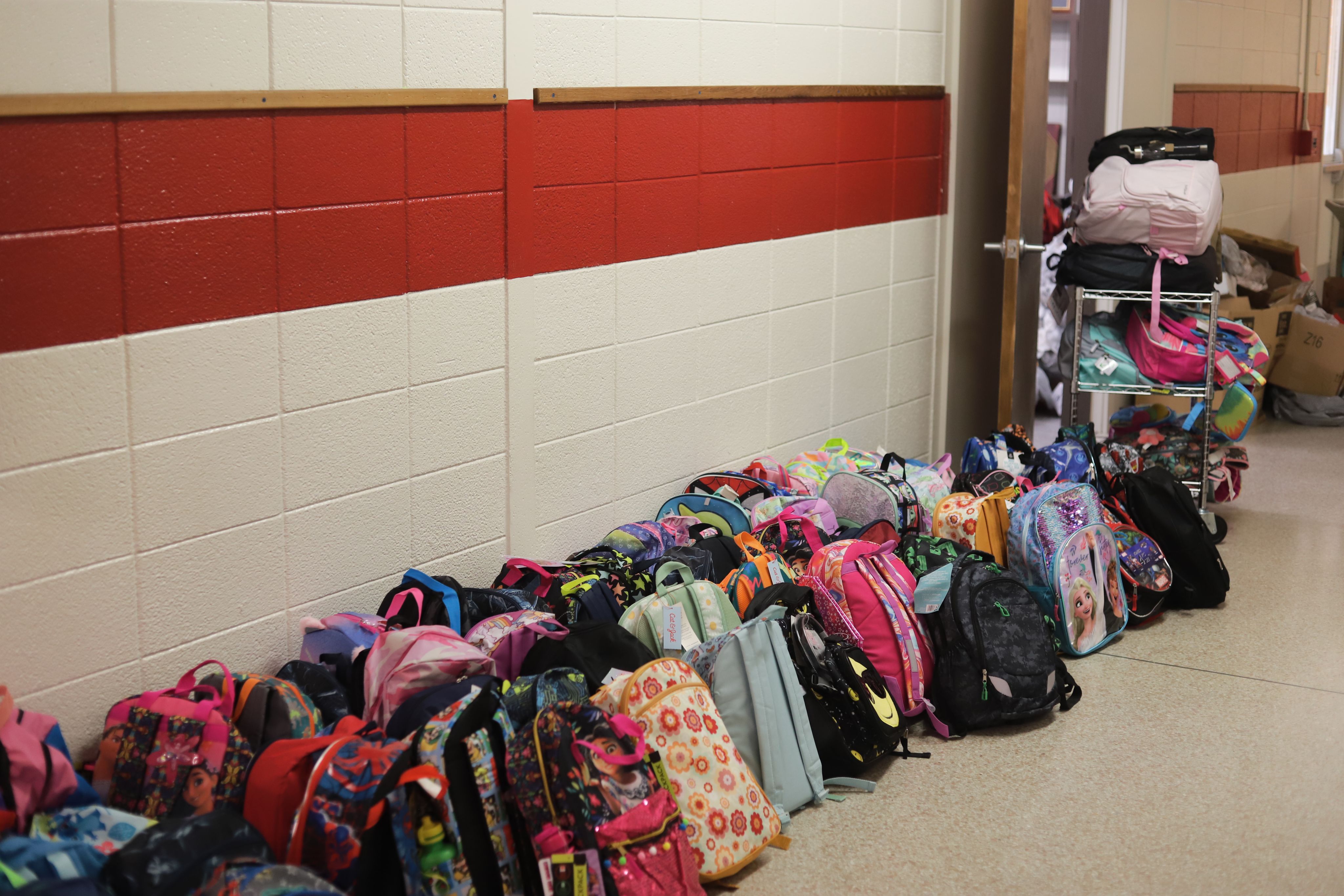 Bookbags lining the hallway