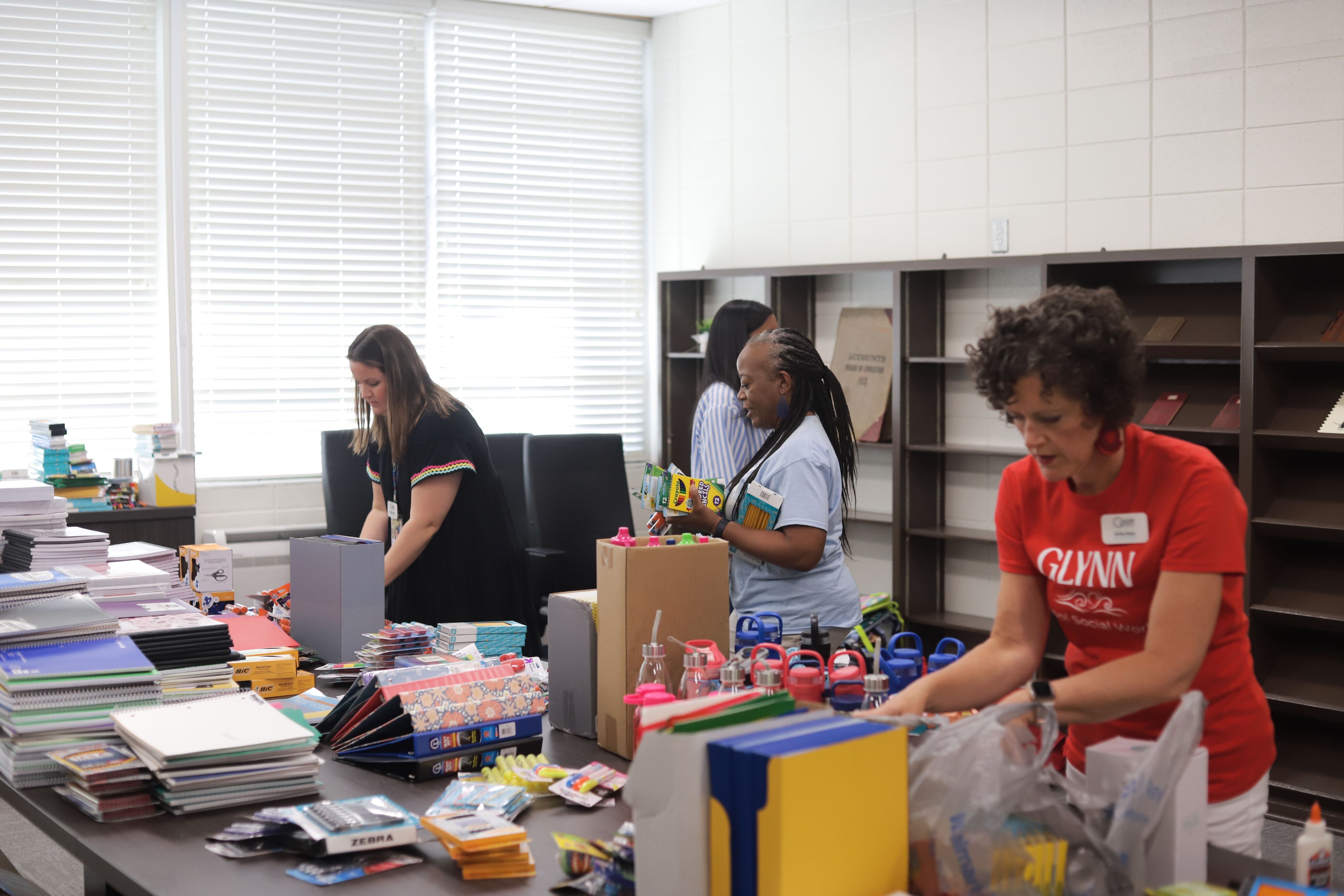 School Social Workers sorting supplies