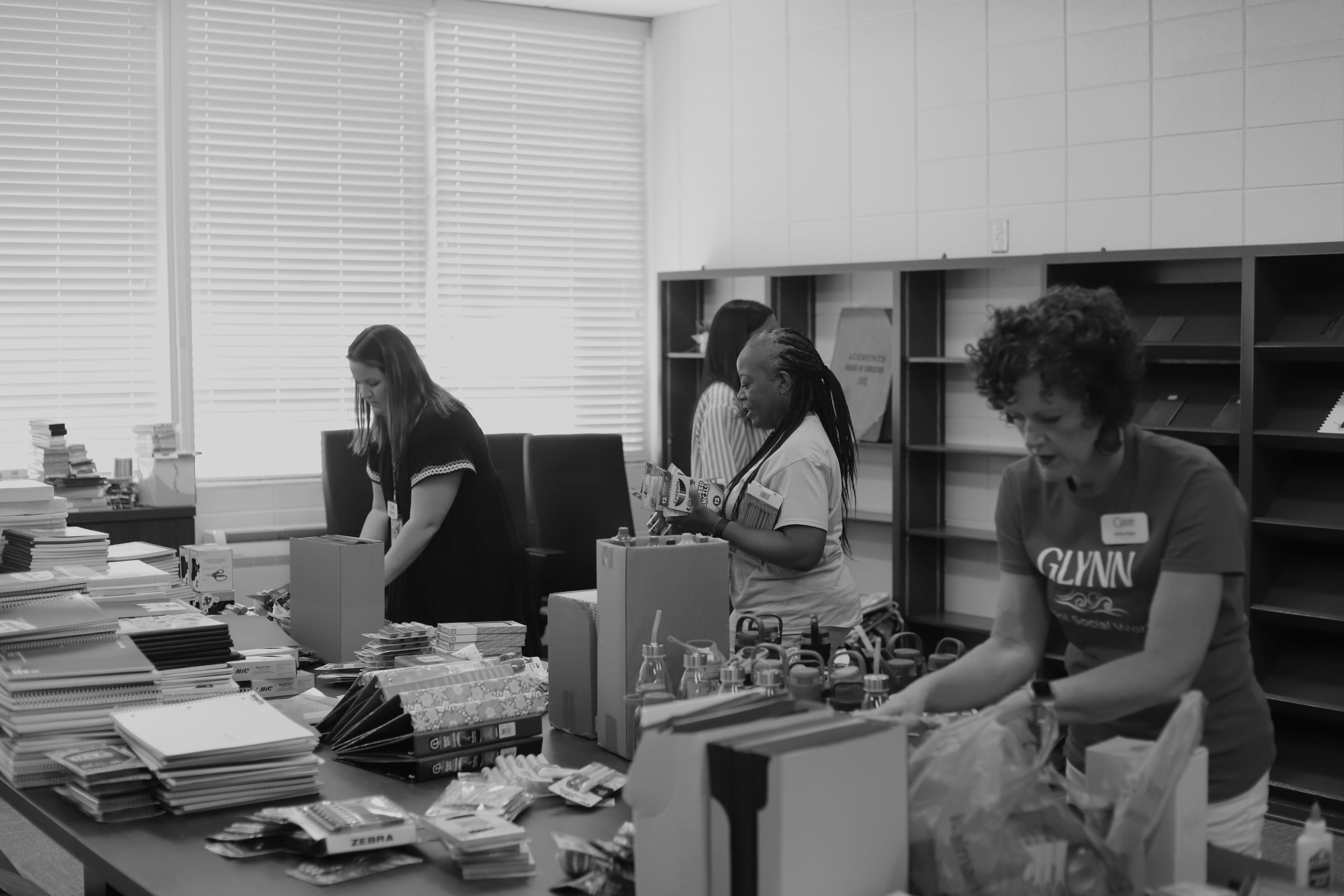 School Social Workers sorting supplies