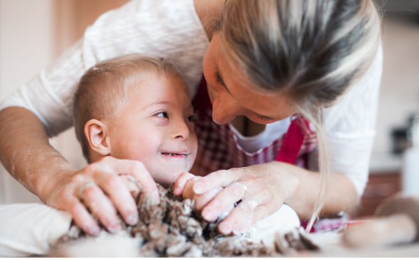 boy smiling at mom